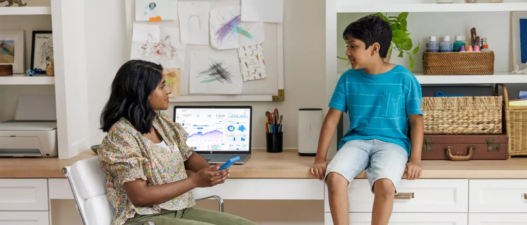 mother and son with att air in home office hero